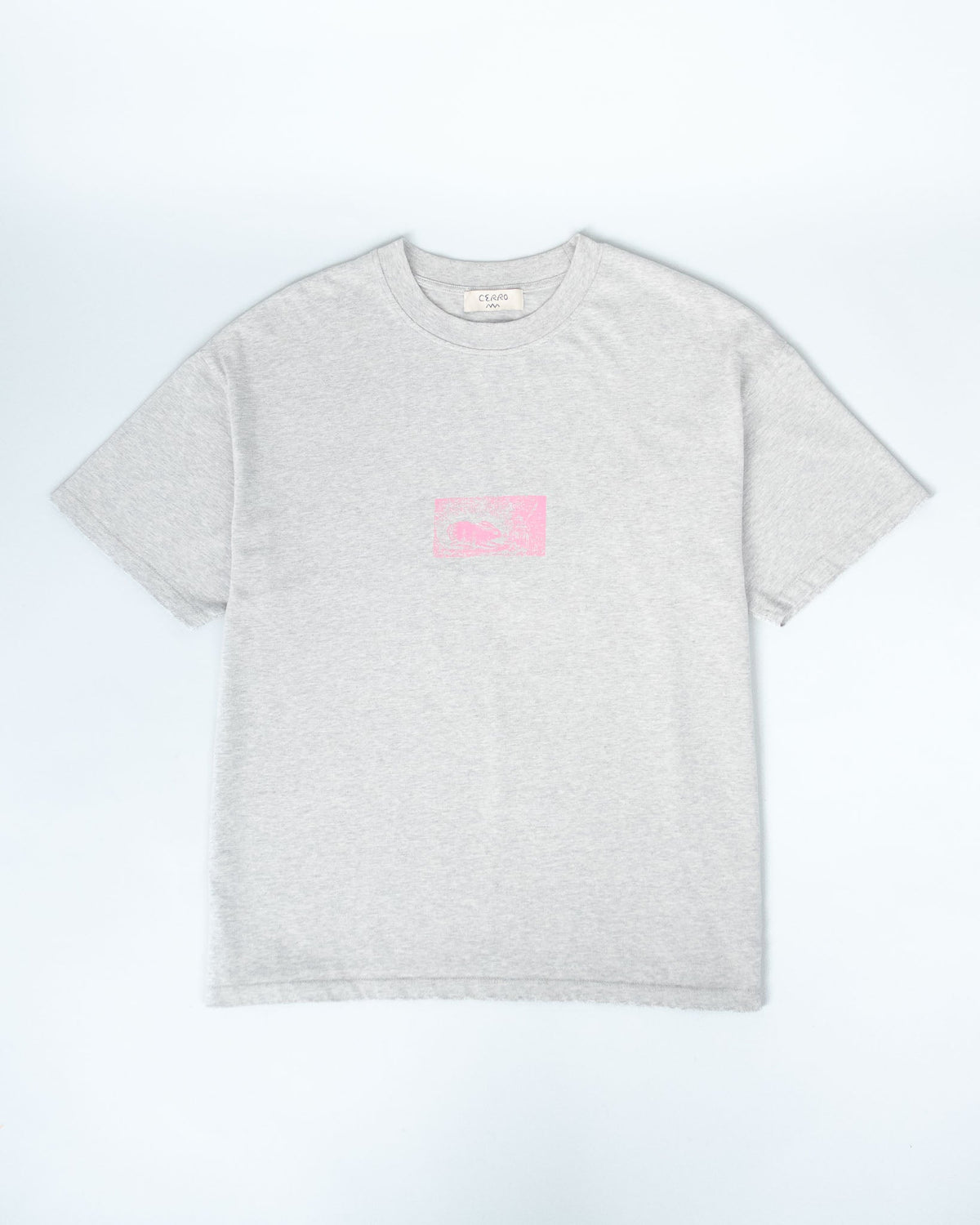 A light heather gray short-sleeve crewneck t-shirt with a small pink graphic box printed on the center chest, displayed flat against a light gray background.