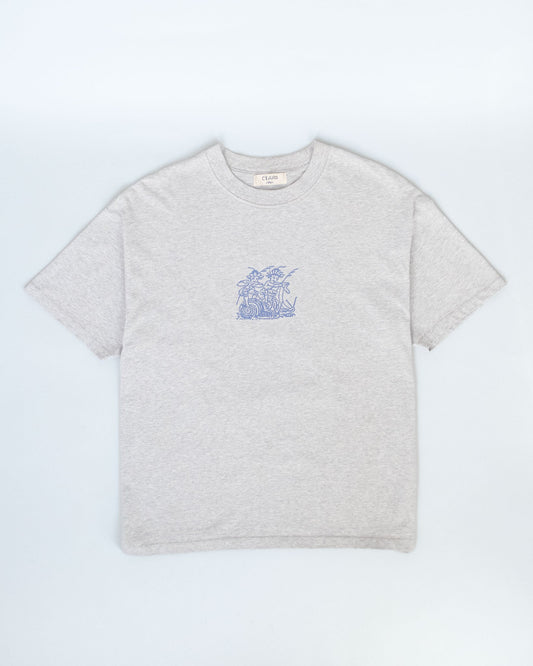 A light heather gray short-sleeve crewneck t-shirt with a small blue graphic print on the left chest, laid flat against a light gray background.